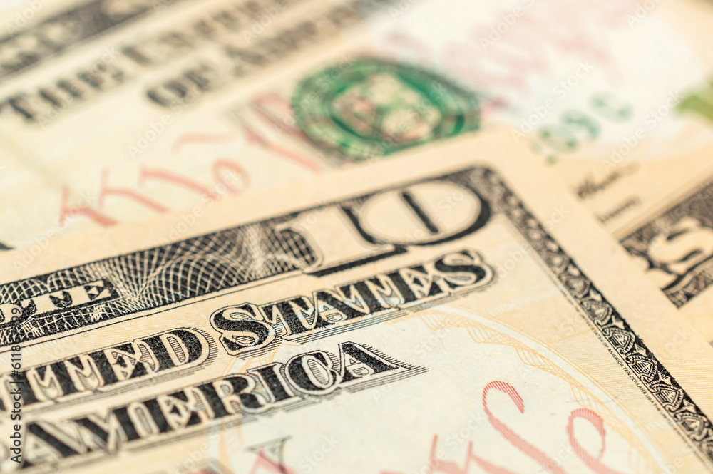 Bills of ten dollars. Close up. Abstract financial background. Bills of ten dollars. Close up. Abstract financial background.