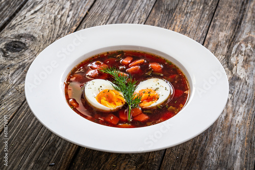 Red borsch - beetroots soup on wooden table