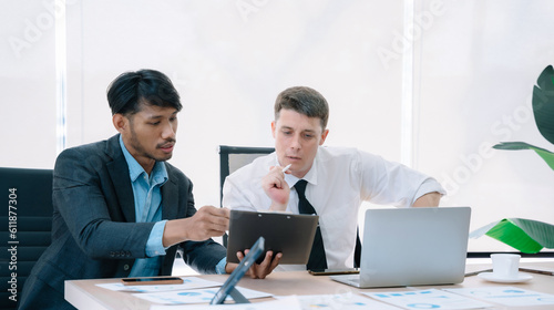 Group of diverse business people discussing a project in a meeting for analysis graph company financial.