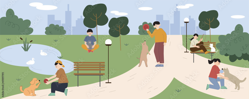 Obraz premium People at park walk and play with pet