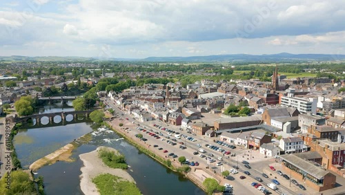This aerial drone video shows the town of Dumfries in Dumfries and Galloway, south Scotland. The river Nith flows through the town center. 