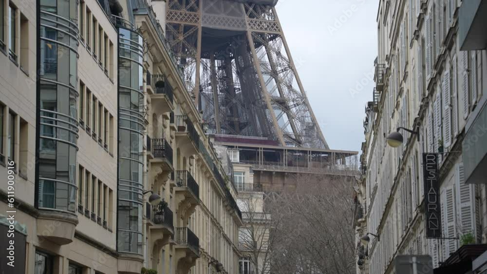 Paris, France - The Tour Eiffel Tower La dame de fer seen from an Alley Street Paris, France - The Tour Eiffel Tower La dame de fer seen from an Alley Street