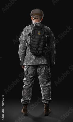 Ukrainian soldier with backpack on dark background, back view