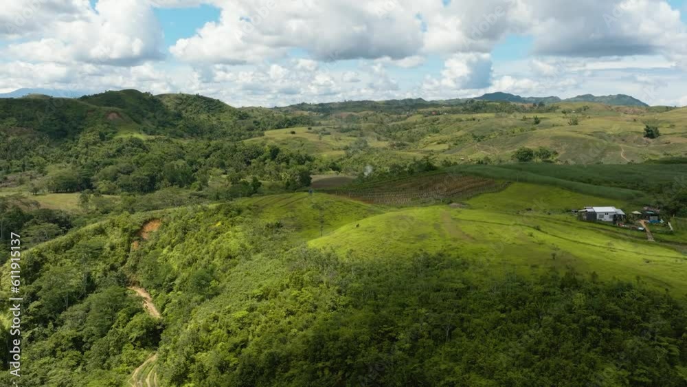 Top view of mountain slopes with farmland of farmers. Negros, Philippines Top view of mountain slopes with farmland of farmers. Negros, Philippines