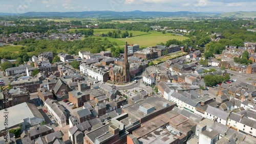 This aerial drone video shows the town of Dumfries in Dumfries and Galloway, south Scotland. You can see a beautiful old church in this town. 