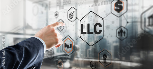 Limited Liability Company concept. Businessman touched LLC