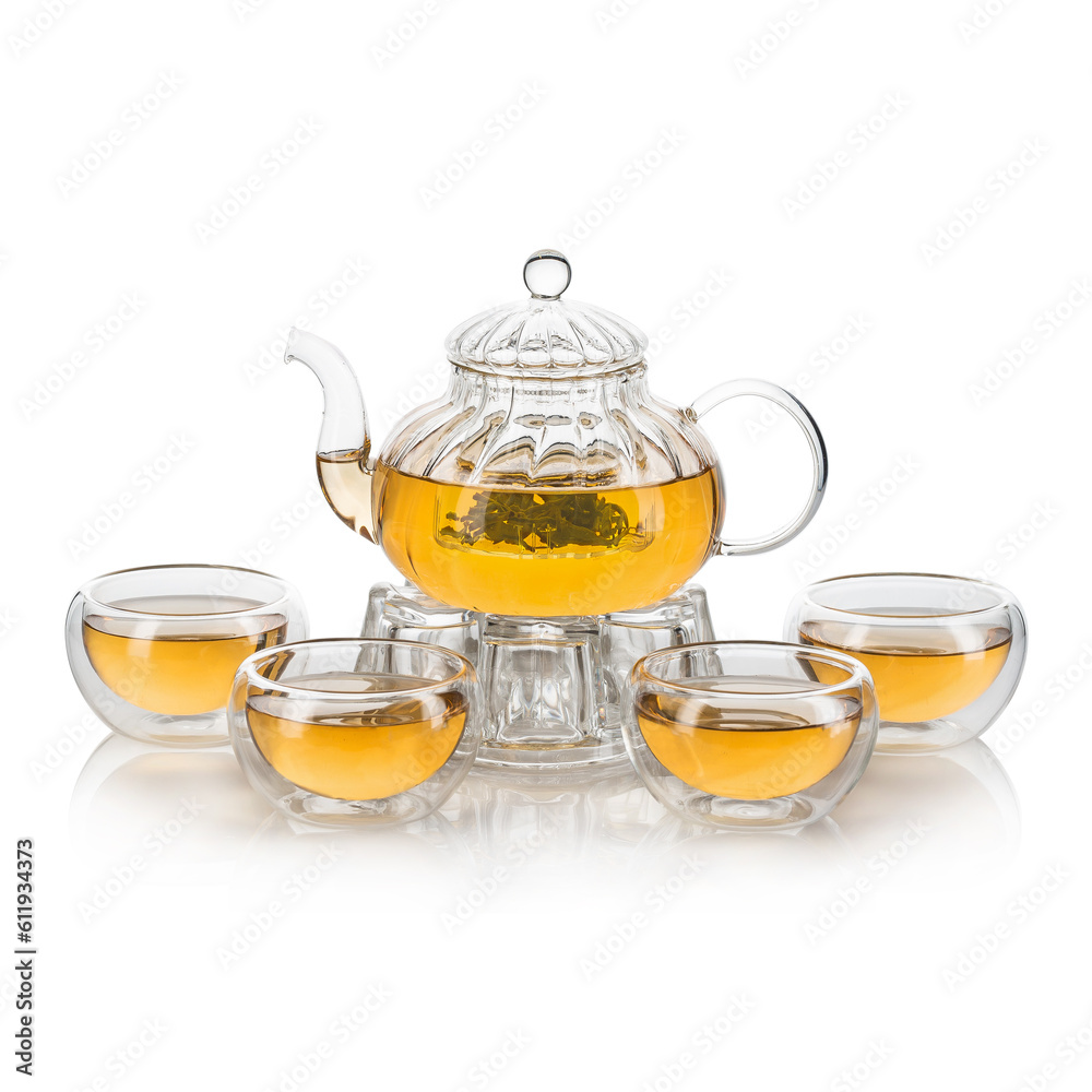 Glass Teapot and cups with green tea on white background Glass Teapot and cups with green tea on white background