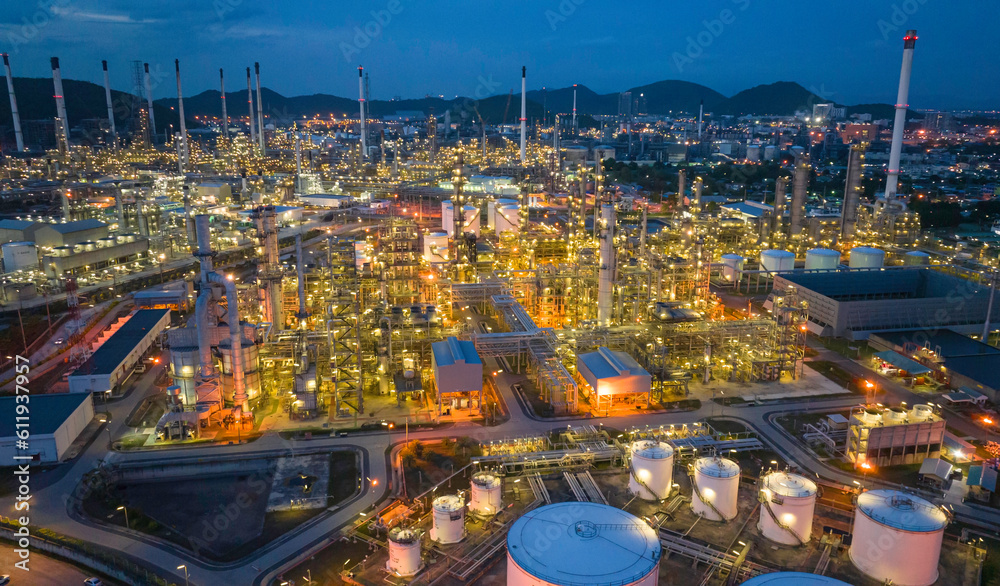 Fototapeta premium Oil refinery plant from industry zone, Aerial view tank oil and gas petrochemical industrial, Refinery factory oil storage tank