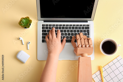 Human hand and wooden robot...