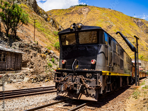 Traditional Devil's Nose train running on beautiful andean landscape, Alausi, Ecuador
