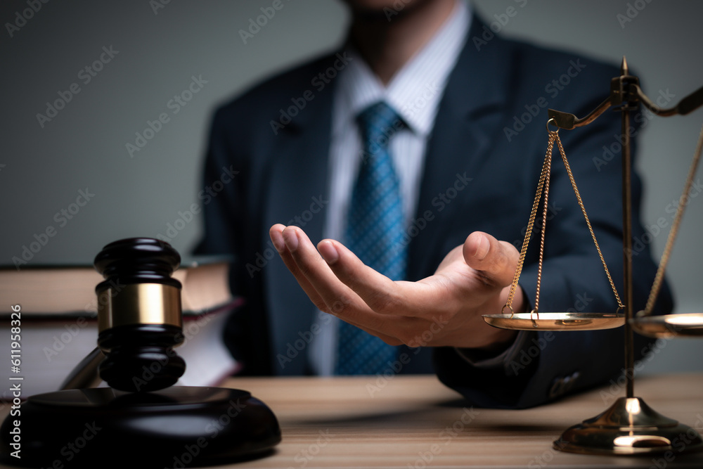 Lawyer's hand concept Justice  with Judge gavel, Businessman in suit or Hiring lawyers in the digital system. Legal law, prosecution, legal adviser, lawsuit, detective, investigation,legal consultant. - obrazy, fototapety, plakaty 