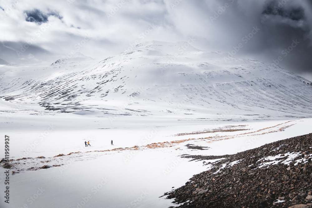 people on snow covered mountains, iceland