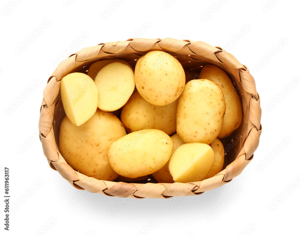 Wicker basket with raw baby potatoes on white background Wicker basket with raw baby potatoes on white background