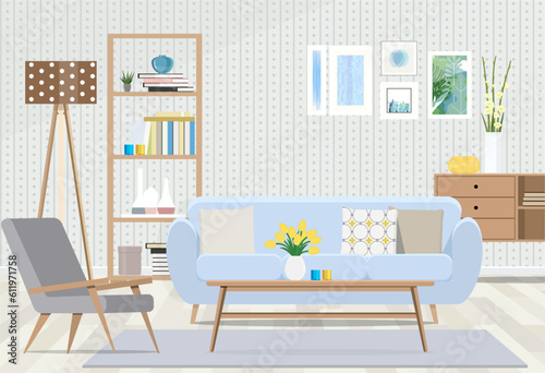Interior design of a room with a blue sofa, Scandinavian furniture on the background of wallpaper. 