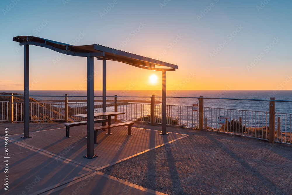Outdoor picnic table on the beach  at sunset, O'Sullivan Beach, South Australia