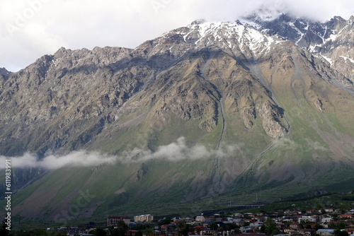 Snow-covered mountain peaks of the Main Caucasian Range. Landscape in the mountains of Georgia.