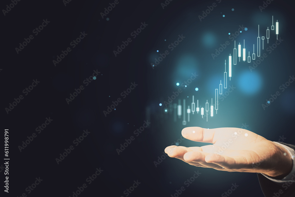 Close up of businessman hand holding glowing candlestick forex chart index on blurry dark bokeh background with mock up place. Investment and financial growth concept. Double exposure. Close up of businessman hand holding glowing candlestick forex chart index on blurry dark bokeh background with mock up place. Investment and financial growth concept. Double exposure.