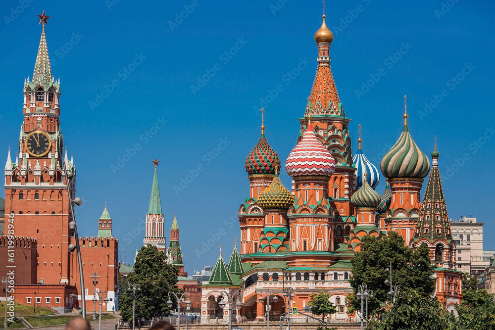 MOSCOW, RUSSIA - JUNE 9, 2023: St. Basil's Cathedral on Vasilievsky Descent on Red Square on a sunny day against a bright blue sky. A popular tourist attraction in Moscow.