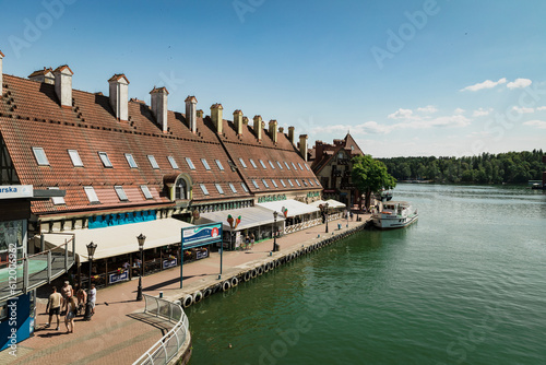 Fototapeta Naklejka Na Ścianę i Meble -  Port w Mikołajkach. Wakacyjna podróż. Słoneczny dzień w Mikołajkach.
