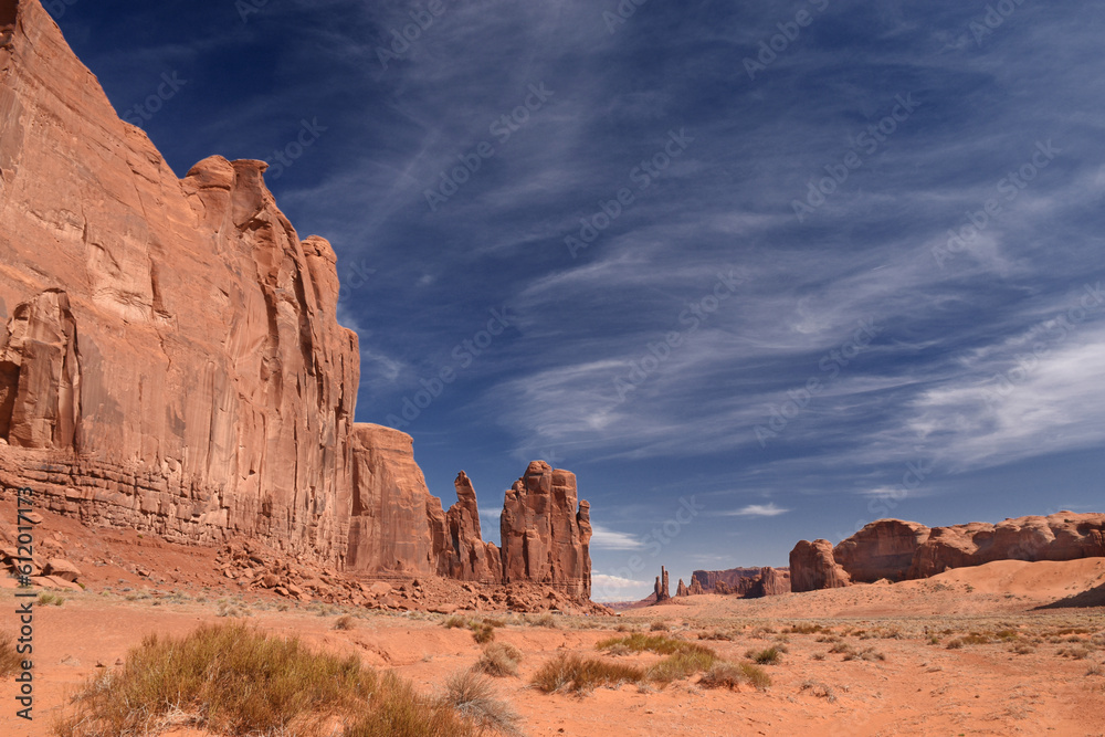 Amazing red rock formations in the Monument Valley, Navajo Tribal Park, Utah, USA. Dry dessert landscape Amazing red rock formations in the Monument Valley, Navajo Tribal Park, Utah, USA. Dry dessert landscape