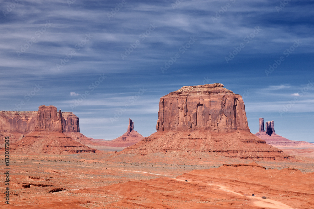 Amazing red rock formations in the Monument Valley, Navajo Tribal Park, Utah, USA. Dry dessert landscape