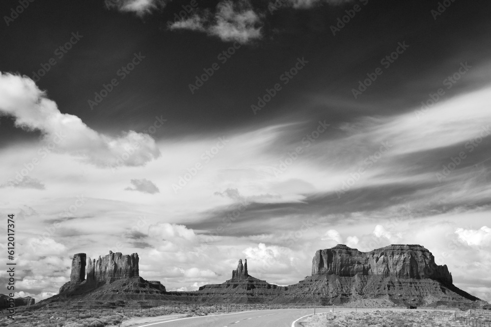 Amazing rock formations in the Monument Valley, Navajo Tribal Park, Utah, USA. Dry landscape. Black and white photography. Amazing rock formations in the Monument Valley, Navajo Tribal Park, Utah, USA. Dry landscape. Black and white photography.
