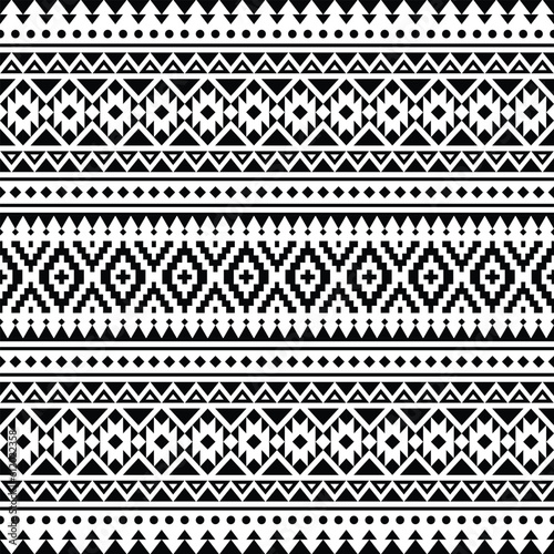 Ethnic seamless geometric pattern. Aztec tribal abstract vector texture. Black and white colors. Design for textile, fabric, clothes, curtain, rug, ornament, wallpaper, background, paper.