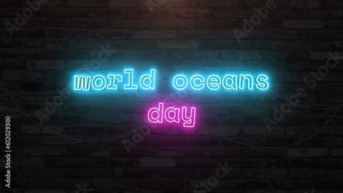 World oceans day with neon text effect in wall background. Seamless looping video