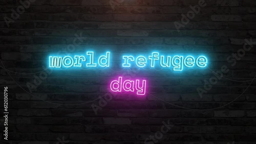World refugee day with neon text effect in wall background. Seamless looping video 