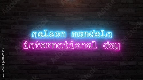 Nelson mandela international day with neon text effect in wall background. Seamless looping video