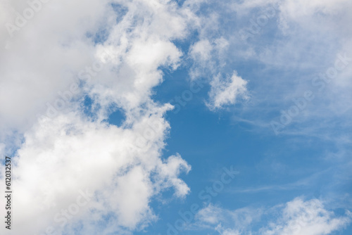 Blue sky with heavy clouds