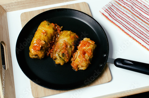 Ukrainian dish vegan cabbage rolls in a pan