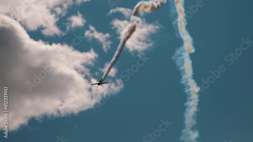 Private plane crash. A small plane during an aerobatic simulation. Airplane engine failure, white smoke coming out of the engine as the plane crashes. Aircraft engine failure. Airplane accidents.