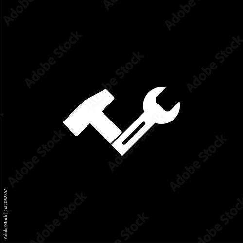 Hammer and wrench tool glyph icon. Symbol, logo illustration isolated on black background