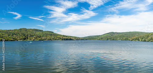 Panorama of a natural body of water in a forest landscape. Brno Reservoir - Czech Republic.