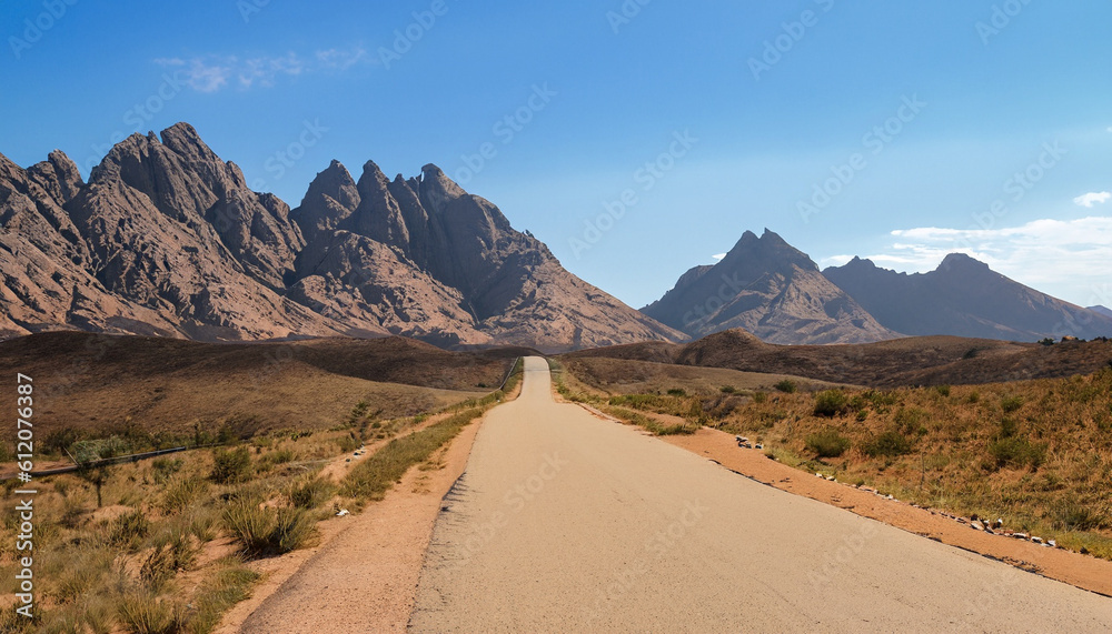 Road way to spitzkoppe mountains the spitzkoppe is a group of bald granite peaks Road way to spitzkoppe mountains the spitzkoppe is a group of bald granite peaks
