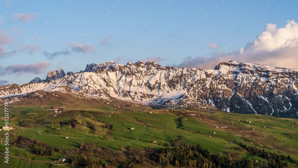Timelapse video of clouds moving over rugged mountains and wide alpine meadows. Rosszähne / seen from Seiser Rosszahnscharte seen from Seiser Alm (Alpe di Siusi) in the Dolomites, South Tyrol, Italy. Timelapse video of clouds moving over rugged mountains and wide alpine meadows. Rosszähne / seen from Seiser Rosszahnscharte seen from Seiser Alm (Alpe di Siusi) in the Dolomites, South Tyrol, Italy.
