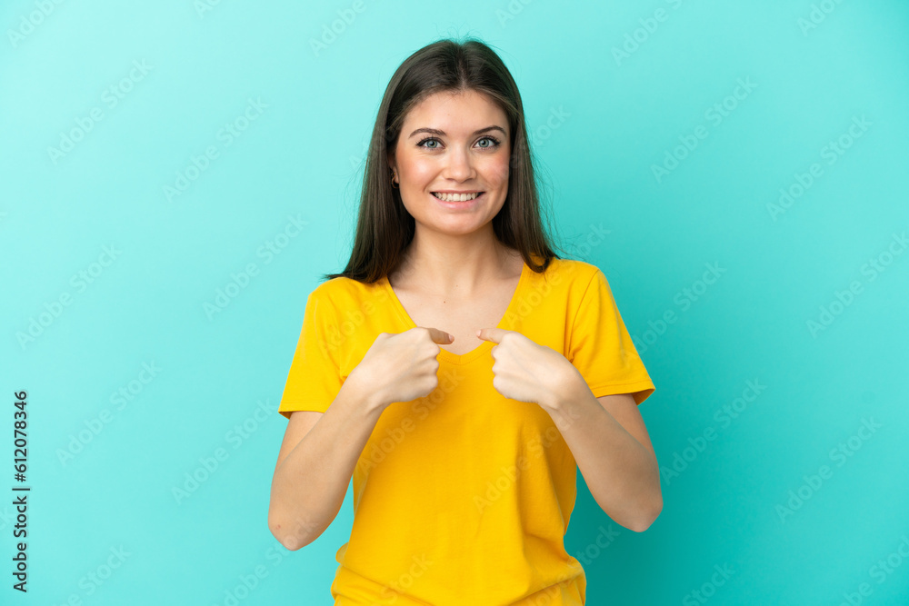Young caucasian woman isolated on blue background with surprise facial expression Young caucasian woman isolated on blue background with surprise facial expression
