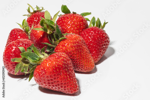 Some strawberries on a white background