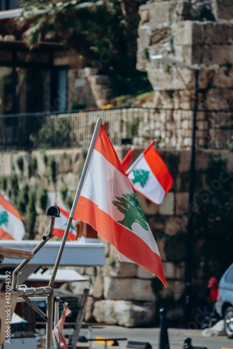 The Lebanese flag in the center of Byblos fluttering in the wind