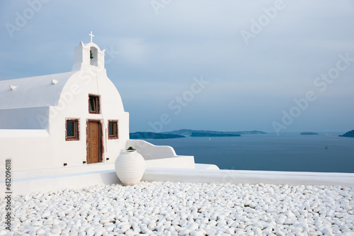 White architecture in Santorini island, Greece. Church in Oia town.