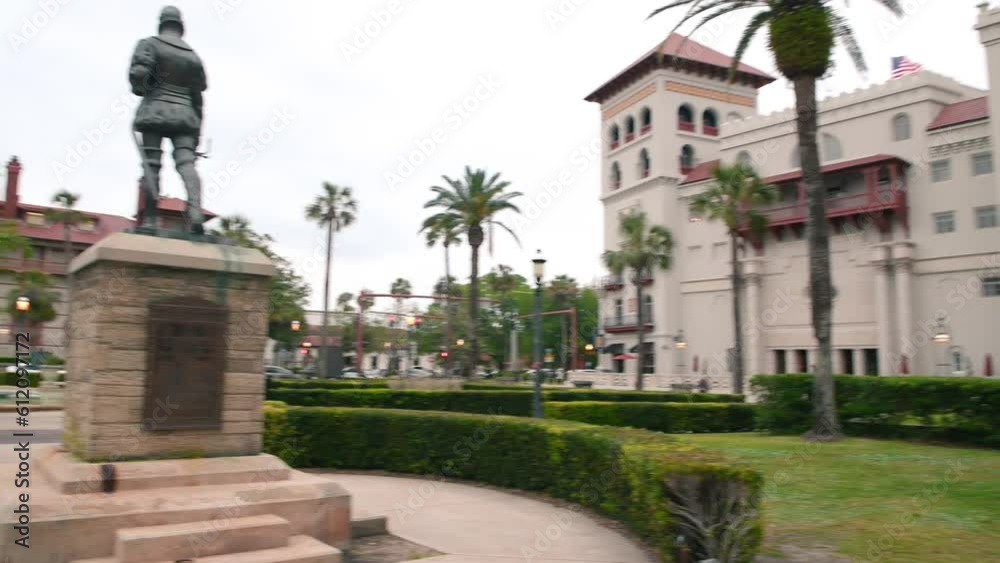 ST AUGUSTINE, FL - APRIL 9, 2018: Flagler College exterior view with tourists ST AUGUSTINE, FL - APRIL 9, 2018: Flagler College exterior view with tourists