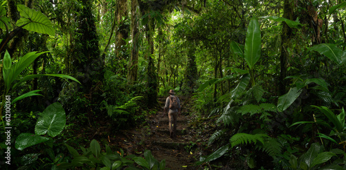 Backpacker walking in the rainforest. AI generative © quickshooting