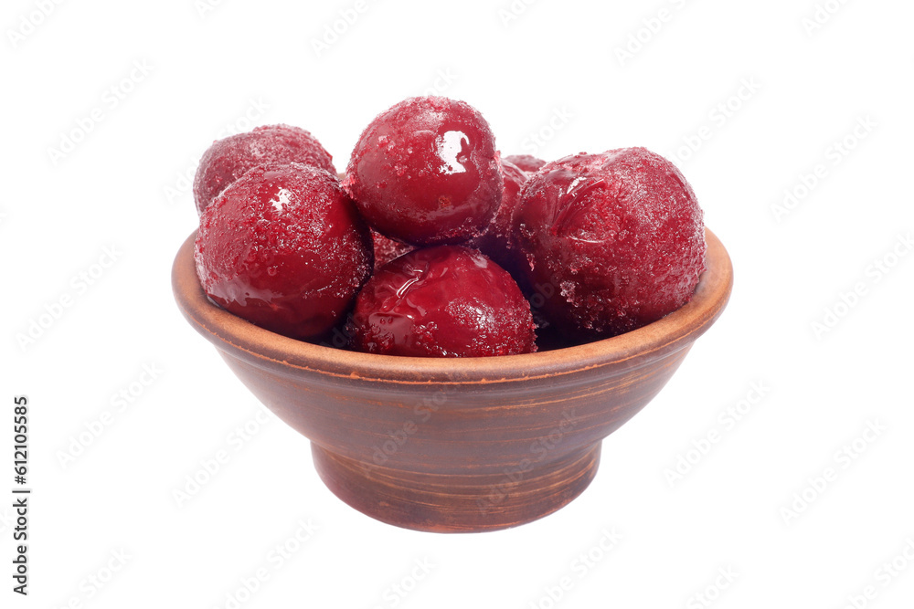 frozen plums in a bowl isolated on white frozen plums in a bowl isolated on white