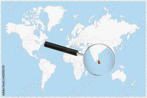 Magnifying glass showing a map of Sri Lanka on a world map.