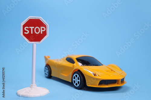 Toy car and stop sign