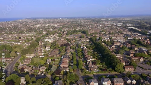 Aerial footage over Hurst Road in Rustington looking west and beyond from East Preston in West Sussex on the South coast of England.