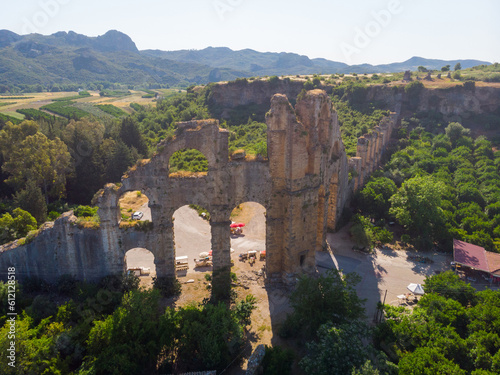 Scenic view of ruins of antique Aspendos Aqueduct, one of most impressive water conveyance structures remaining from Roman era in Turkiye