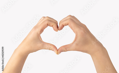 Female hands in the form of a heart on a white background. Concept of love.