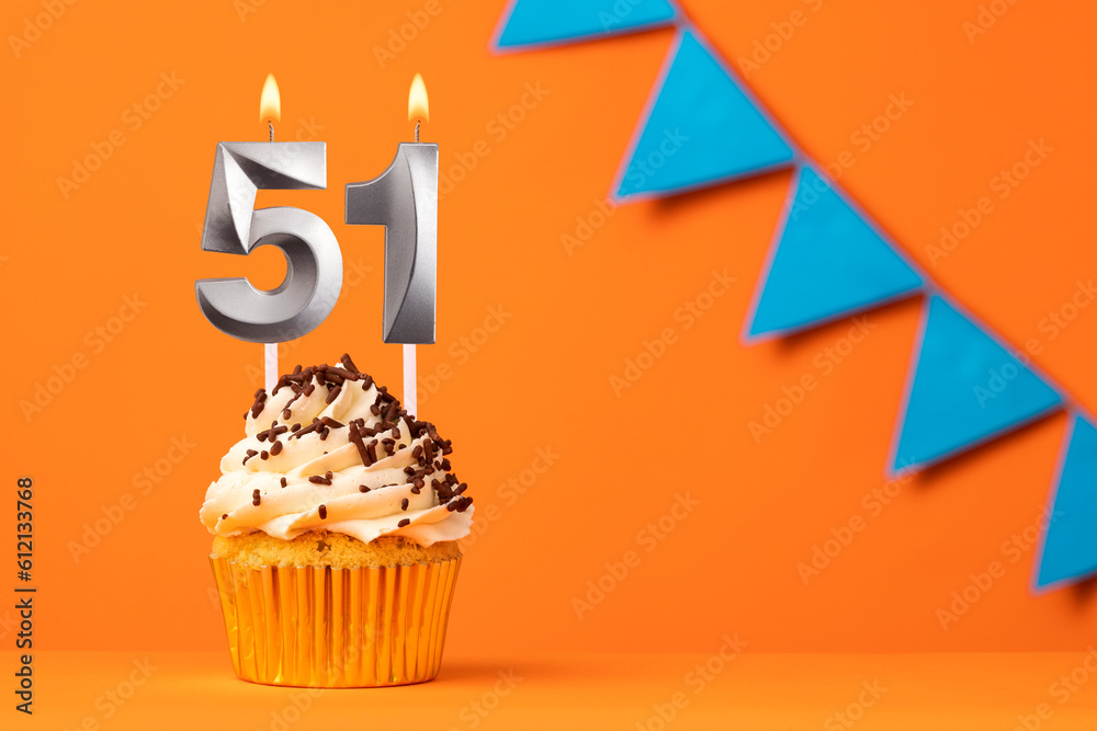 Birthday cake with candle number 51 - Orange background